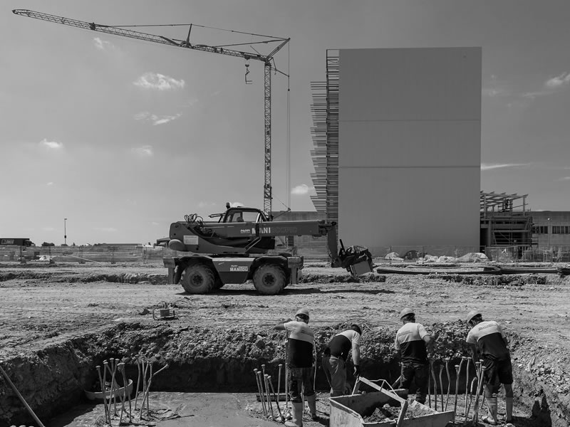 cantiere con lavoratori foto bianco e nero